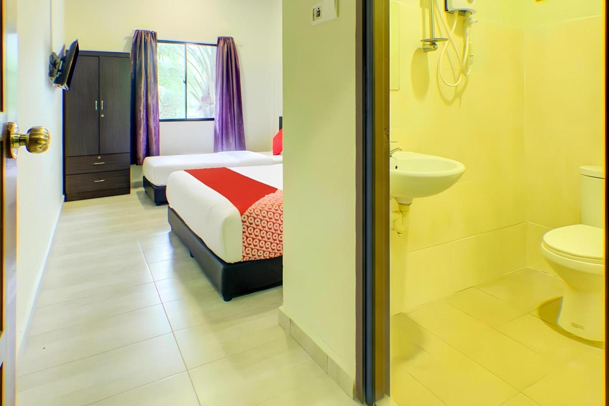 קוטה טינגי Super Oyo 89896 Sedili Inn Resort מראה חיצוני תמונה