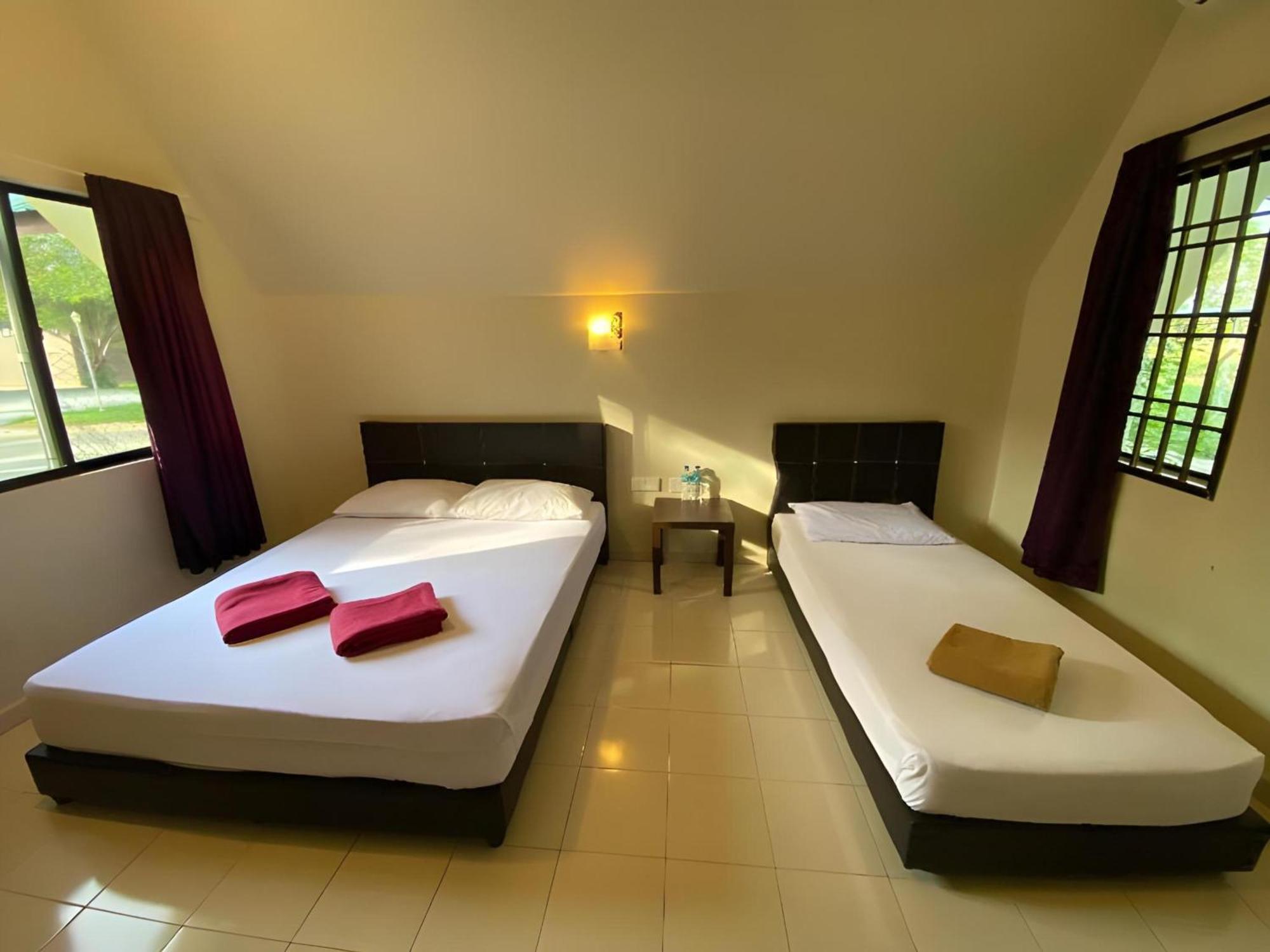 קוטה טינגי Super Oyo 89896 Sedili Inn Resort מראה חיצוני תמונה