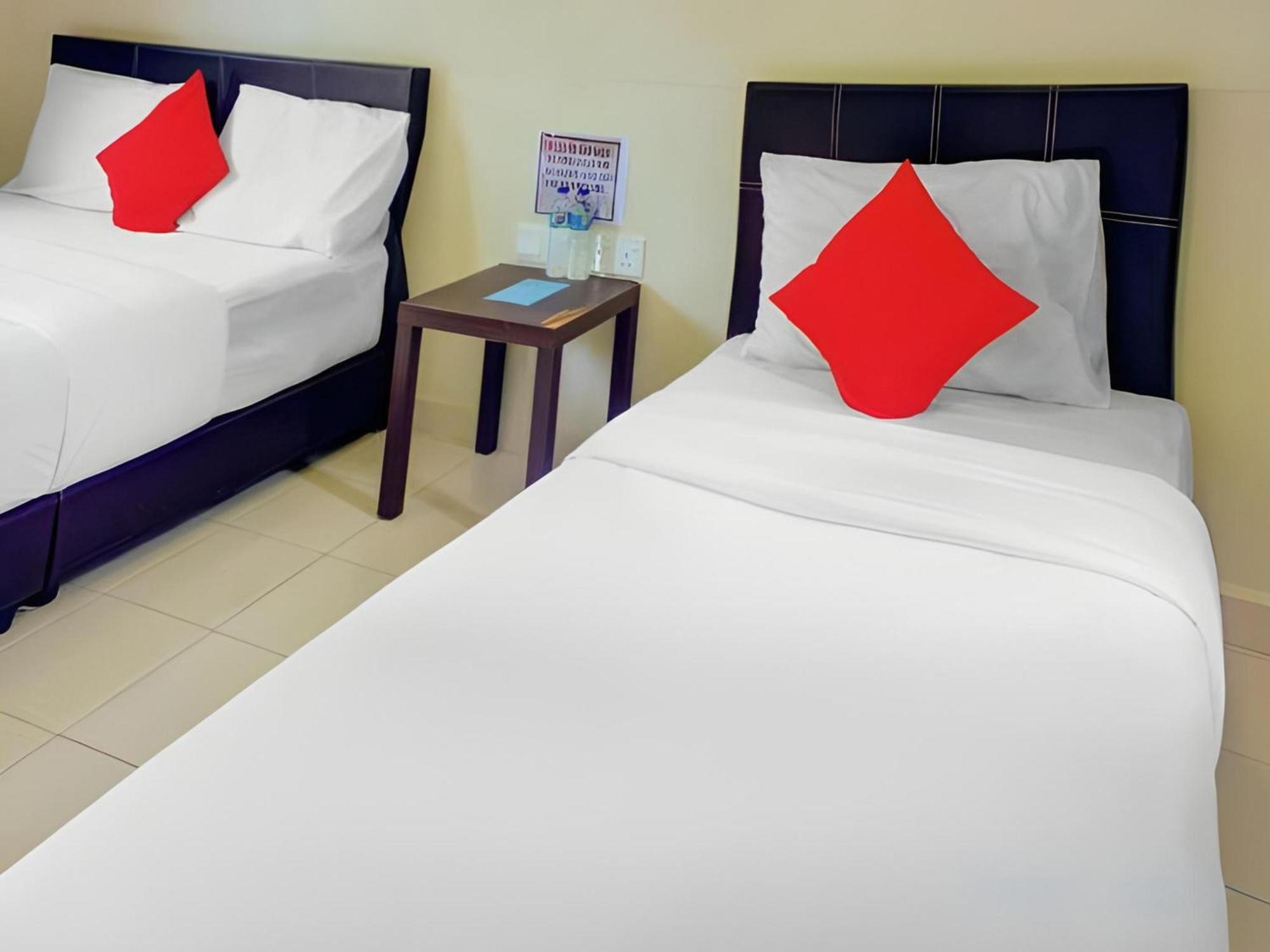 קוטה טינגי Super Oyo 89896 Sedili Inn Resort מראה חיצוני תמונה