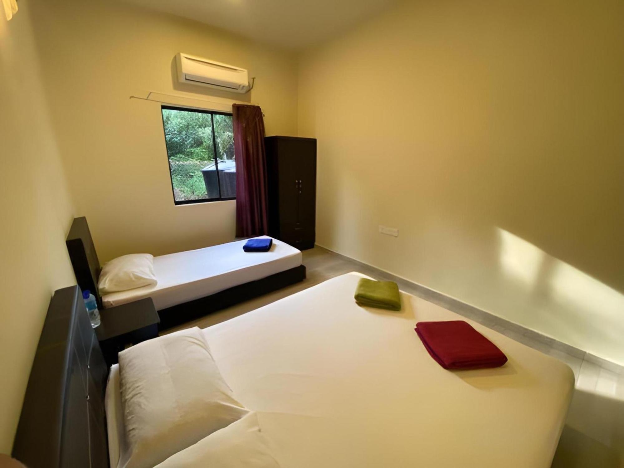 קוטה טינגי Super Oyo 89896 Sedili Inn Resort מראה חיצוני תמונה